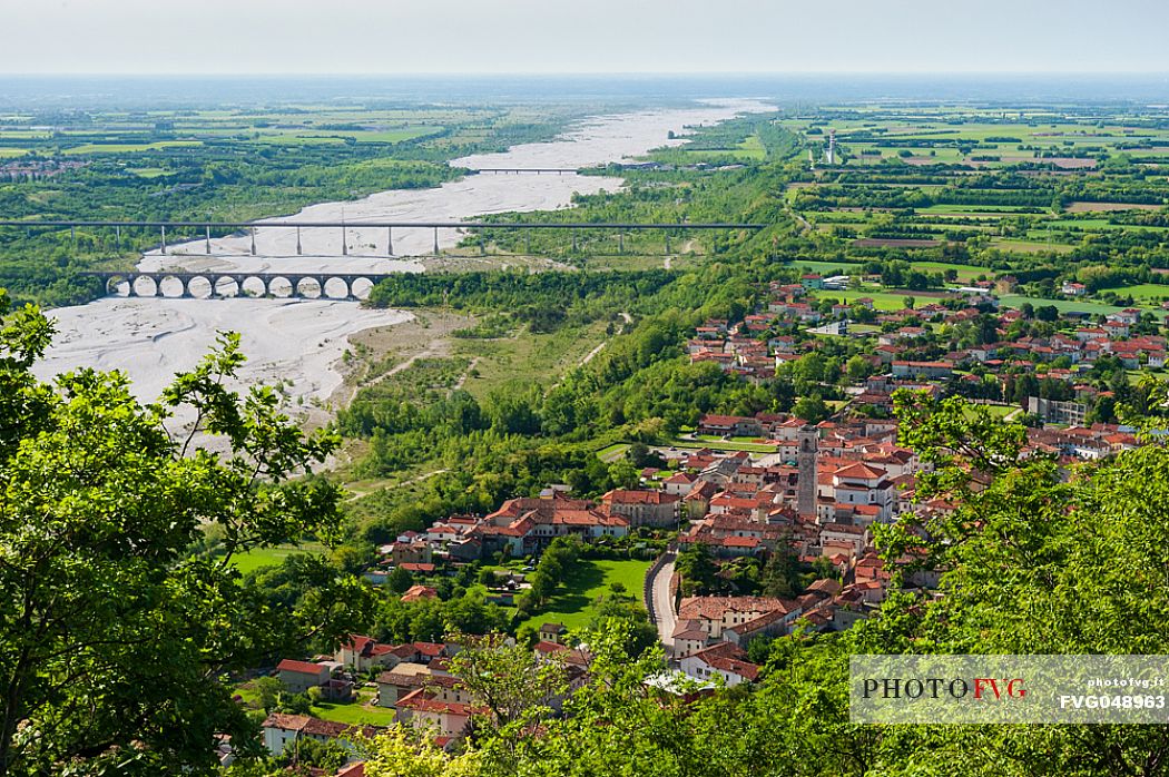 Montereale Valcellina, in the province of Pordenone, is one of the most important places of historical and archaeological interest in Friuli Venezia Giulia. In the background, the bed of the Cellina river and the Ponte Giulio. Italy
