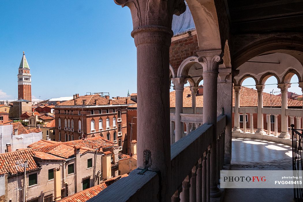 The bell tower and the Cathedral of San Marco in Venice seen from the spiral staircase of Palazzo Contarini del Bovolo, a late Gothic building located in the San Marco district. Italy