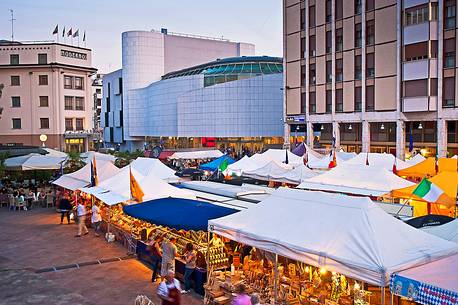 The European market festival in XX and in the background the Verdi Theater, Pordenone, Friuli Venezia Giulia, Italy, Europe