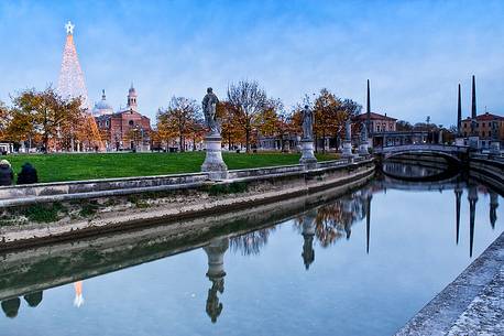 Christmas lights in Prato della Valle, in the background the Basilica of Saint Giustina, Padua, Italy, Europe Christmas lights in Prato della Valle, in the background the Basilica of Saint Giustina, Padua, Italy, Europe