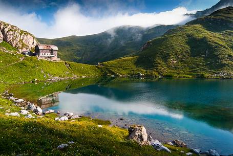 Volaia Lake in the Carnic Alps, in the background the Pichl hutte mountain refuge, 