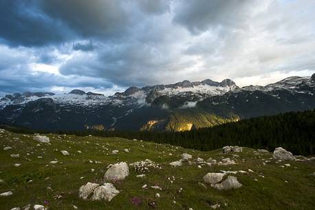 Sunset on Mount Canin from the Montasio plateau, Julian Alps, Friuli Venezia Giulia, Italy, Europe Sunset on Mount Canin from the Montasio plateau, Julian Alps, Friuli Venezia Giulia, Italy, Europe