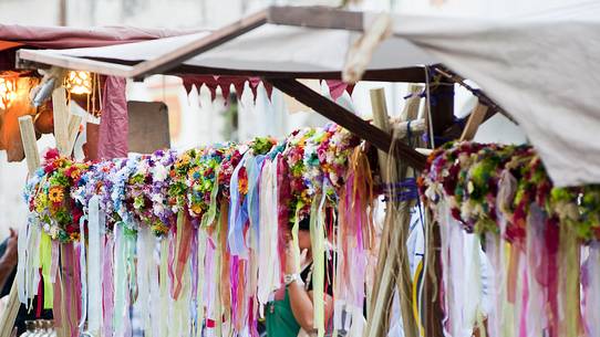 Crowns of flowers for young maidens in a historical reconstruction in Valvasone village, Friuli Venezia Giulia, Italy