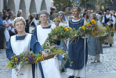 Parade with medieval clothes along the town streets in Spilimbergo during the historical reenactment of the Macia, Friuli Venezia Giulia, Italy, Europe Parade with medieval clothes along the town streets in Spilimbergo during the historical reenactment of the Macia, Friuli Venezia Giulia, Italy, Europe