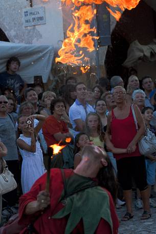 Spectacle of a fire eaters during historical reenactment of Macia in Spilimbergo village, Friuli Venezia Giulia, Italy, Europe