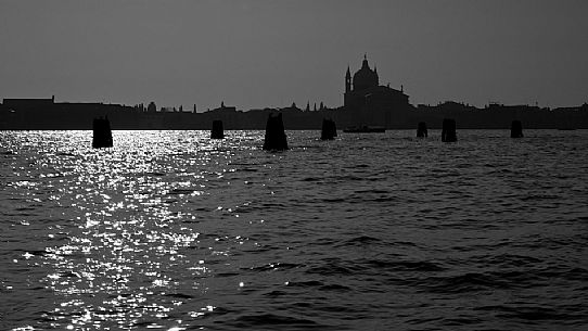 The silhouette of  Chiesa del Santissimo Redentore. It is a 16th-century Roman Catholic church located on Giudecca Island, in the city of Venice, Italy, Europe
