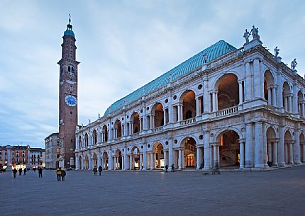The Palladian Basilica, symbol of Vicenza, and Bissara tower in Piazza dei Signori, Vicenza, Veneto, Italy, Europe