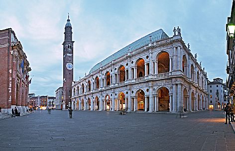 The Palladian Basilica or Basiica Palladiana, symbol of the city, with the Bissara tower and on the left the Palace Capitanio. Piazza dei Signori, Vicenza, Italy, Europe