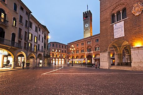 The Palazzo del Podesta and the Civic Tower in Piazza dei Signori, the main square of Treviso, Italy.