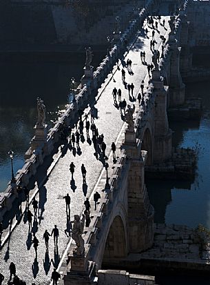 Tourists on the bridge Sant'Angelo in Rome. Italy