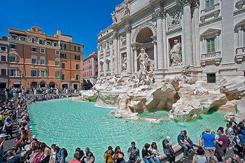 Tourists crowding the Trevi Fountain the largest of Rome; it is also considered one of the most famous fountains in the world. Italy