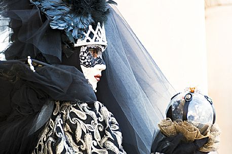 Carnival mask in Saint Mark Square in Venice, Italy.