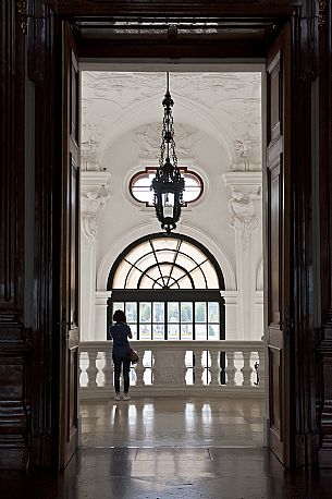 A tourist visits the Belvedere Palace a historic building in Vienna, Austria. A tourist visits the Belvedere Palace a historic building in Vienna, Austria.