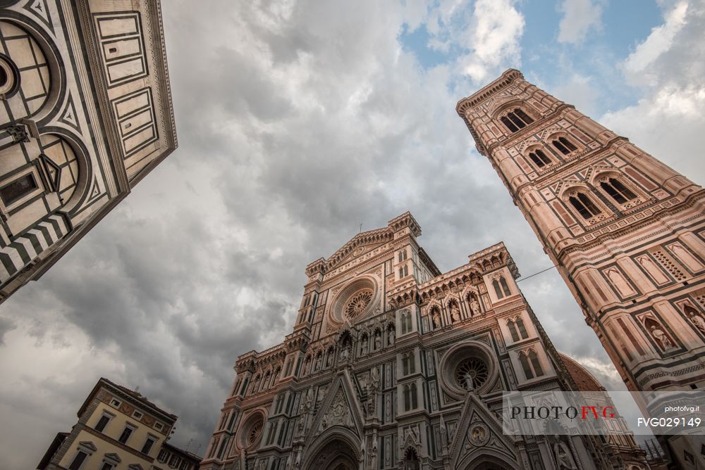 Florence cathedral, Santa Maria in Fiore, enlightend by sunset light, part of the Unesco World Heritage, with its famous Giotto belltower., Florence, Tuscany, Italy