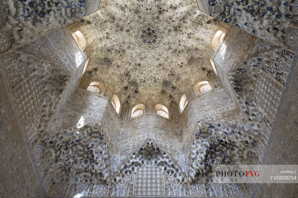 Ceiling hall of the Abencerrajes with its rich nasrid decoration, in the Nazaries palace of the Alhambra, Granada, Spain