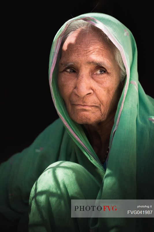 Portrait of old Rajasthani Indian woman with sari, India