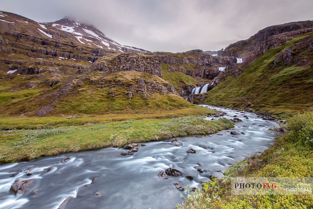The landscape of Mjifjrur ('Narrow Fjord') full of waterfall in the east of Iceland
