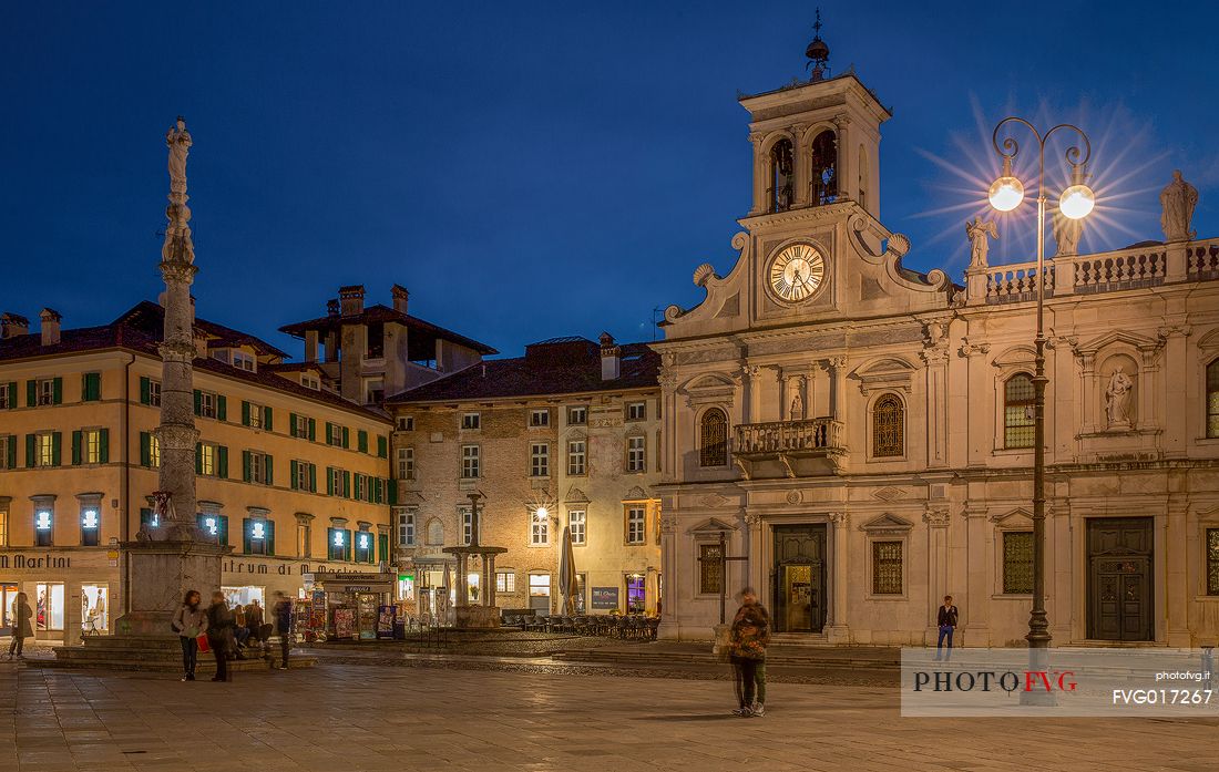 St. James Church and the statue of the Virgin in  San Giacomo square in the historic center of Udine