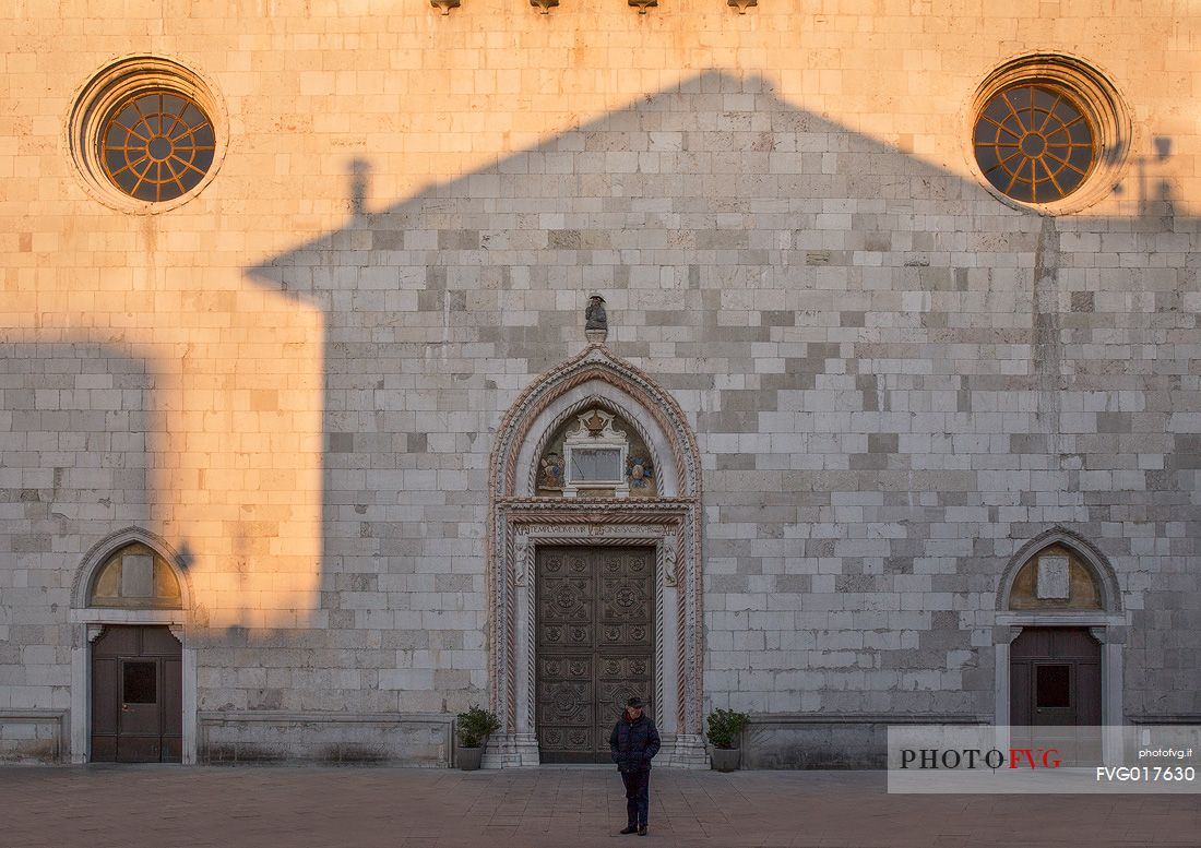 Shadows reflected on the facade of the Cathedral of Cividale del Friuli