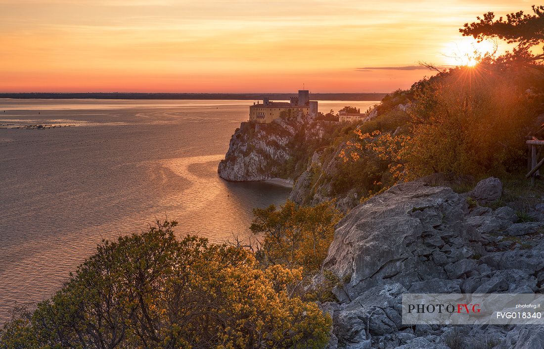 The Duino castle in Trieste seen from the Rilke trail at sunset