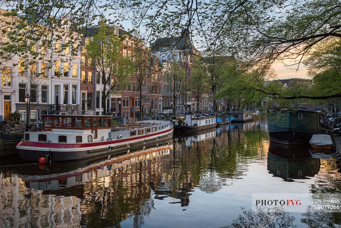 The canal houses along the banks of the characteristic and charming canals of Amsterdam