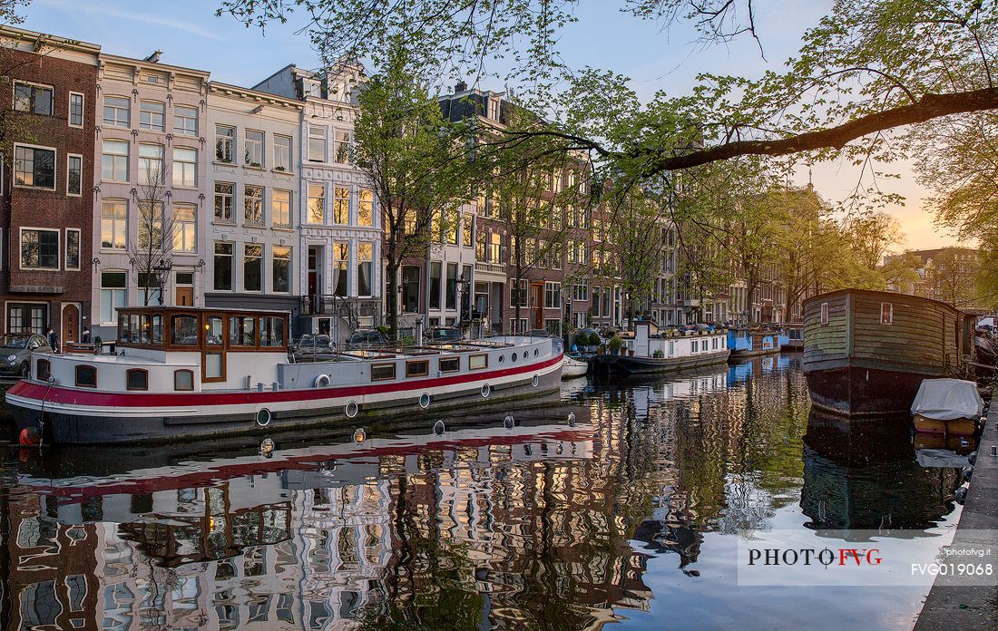 The canal houses along the banks of the characteristic and charming canals of Amsterdam
