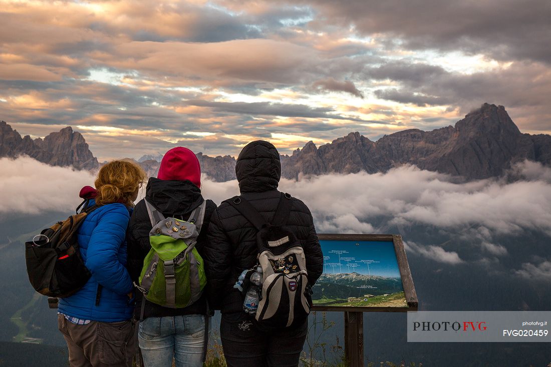 Group of trekkers can enjoy the sunrise on the Sesto Dolomites from Mount Elmo 
