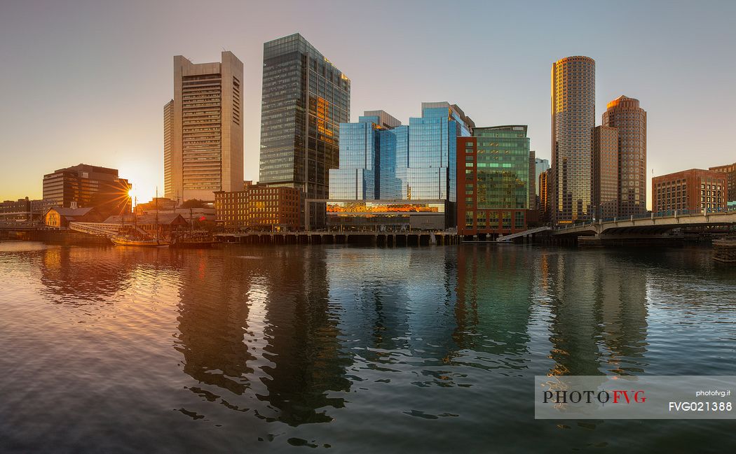 Boston skyline at sunset from the Boston Harbor, New England, USA