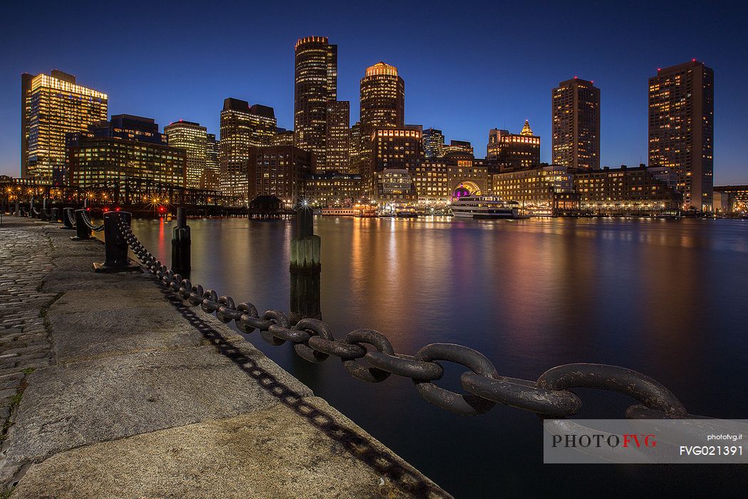Boston skyline from the Boston harbor during the blue hour, New England, USA