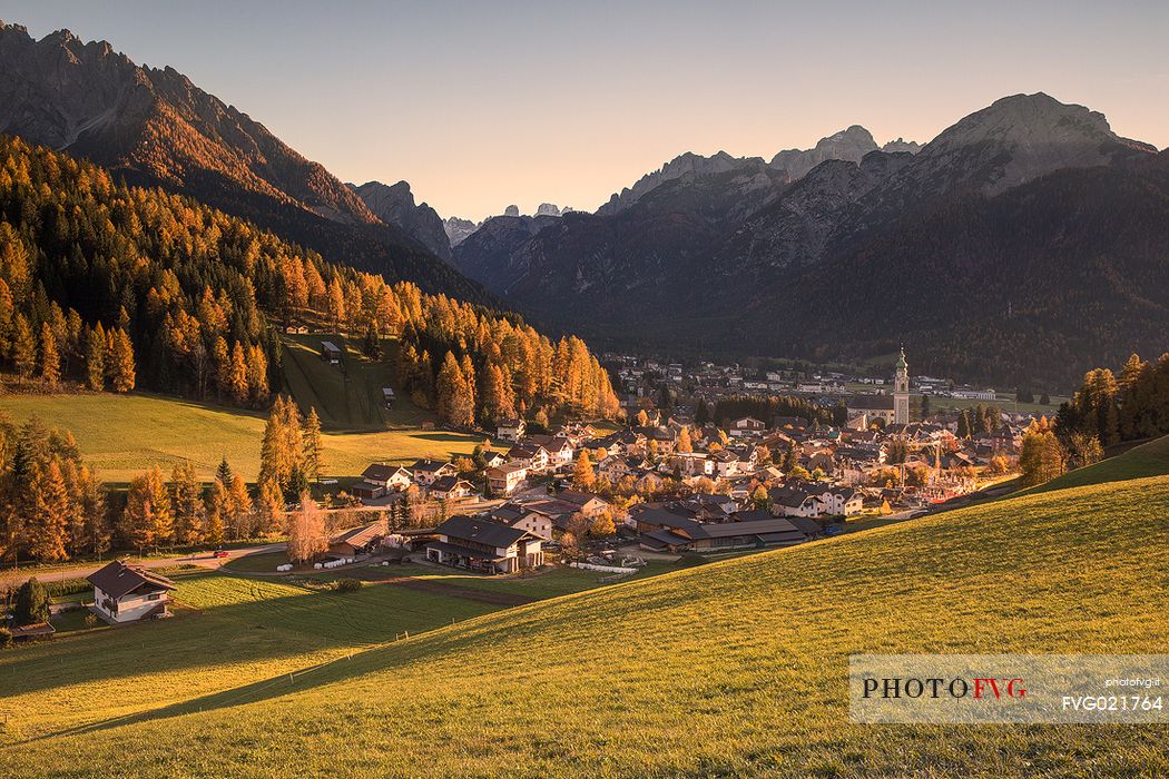 Panoramic view from San Silvestro valley to Dobbiaco at sunset with Braies Dolomiten on background