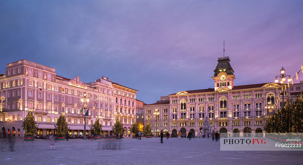 Unity of Italy Square or Piazza Unit d'Italia with the Town Hall on background at Christmas time, Trieste, Italy