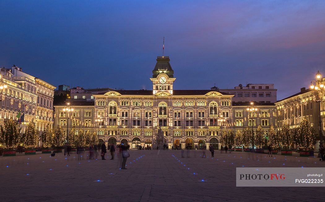 Unity of Italy Square or Piazza Unit d'Italia) with the Town Hall on background at Christmas time, Trieste, Italy