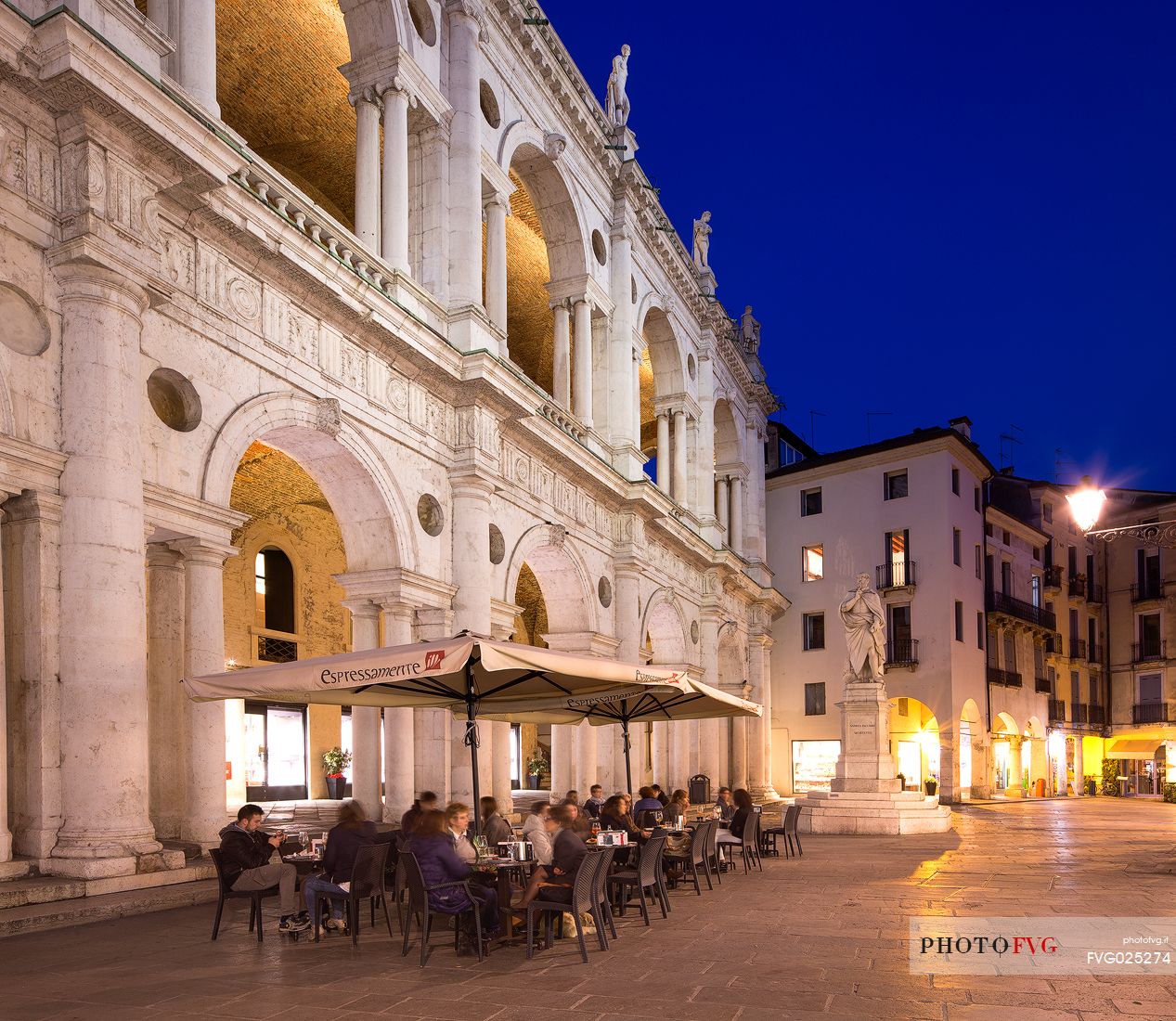 The Piazza dei Signori in the historic center of Vicenza with the facade of the Basilica Palladiana during a spring evening, Vicenza, Italy