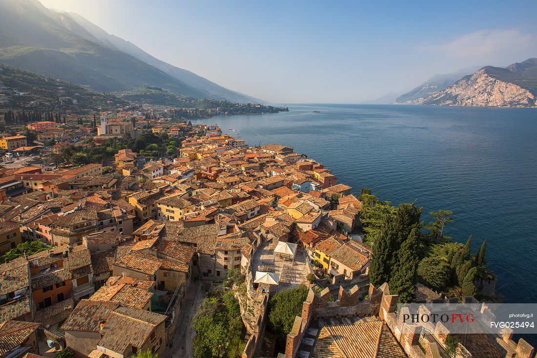The small medieval village of Malcesine on the Garda lake photographed by the Scaligero castle, Italy