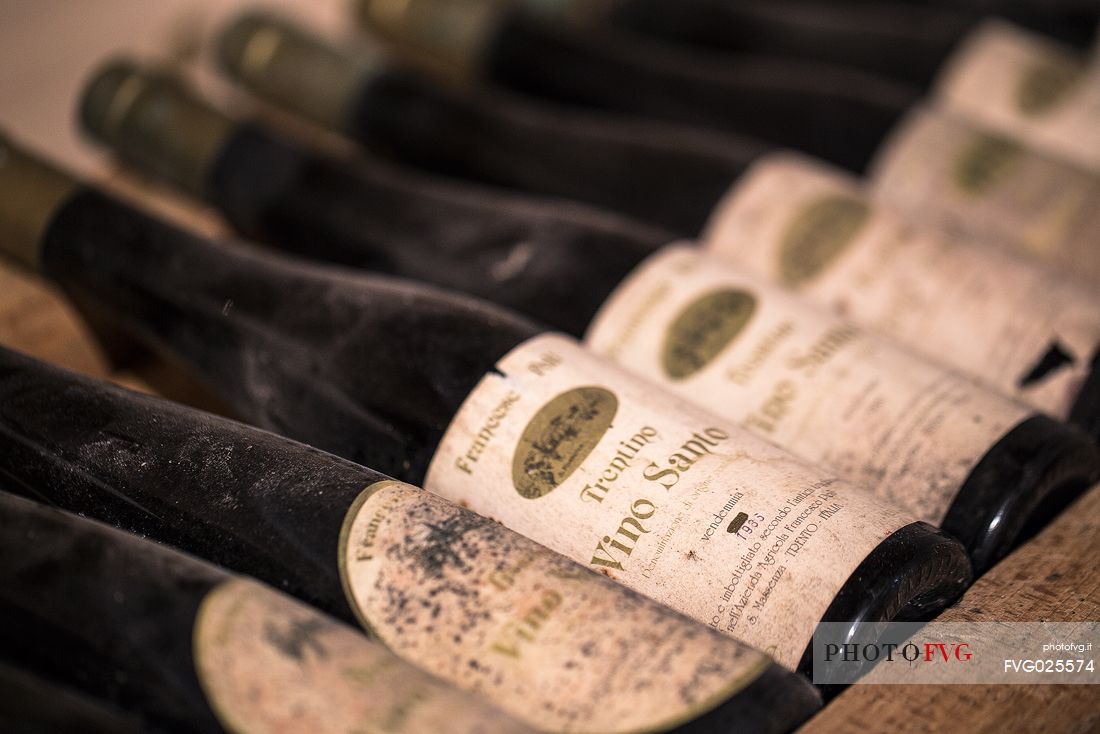 Aged bottles of Vino Santo of the distillery of Francesco Poli in Santa Massenza, Valley of Lakes,Trentino, Italy