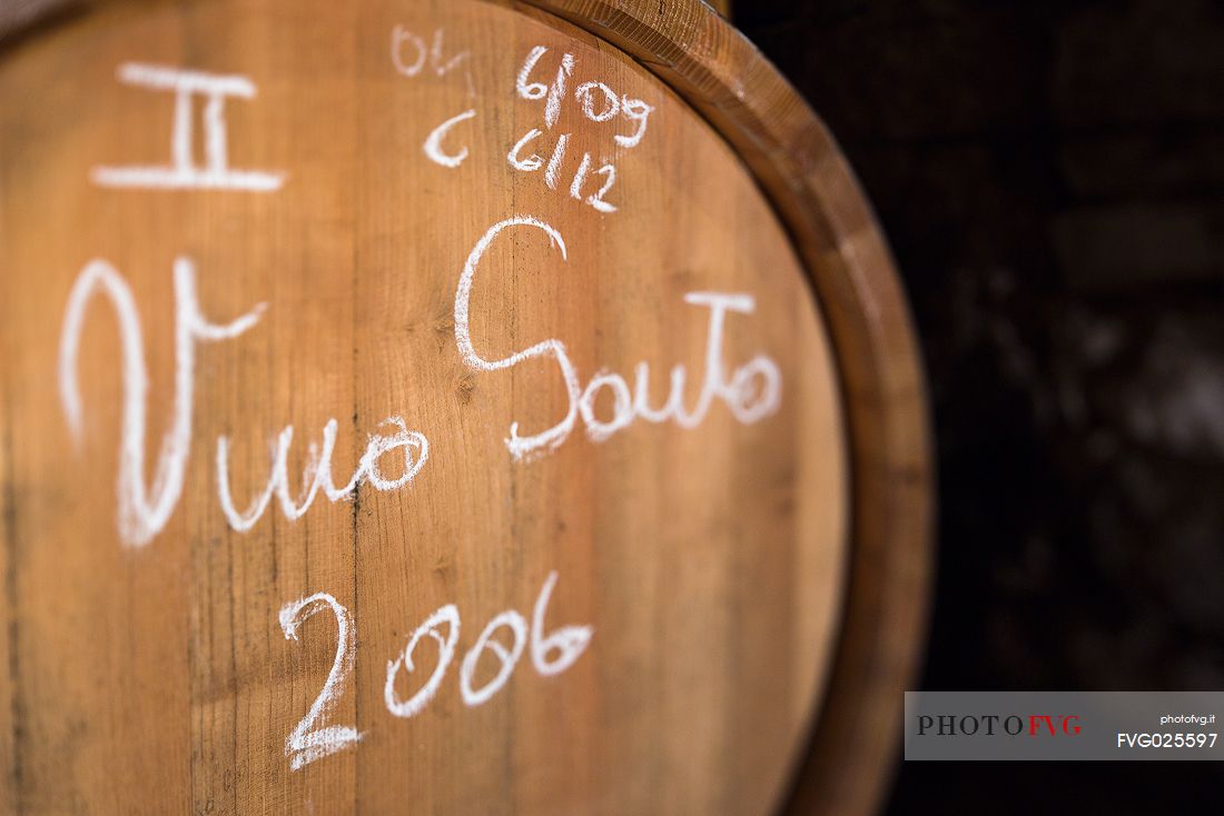 Barrel of Vino Santo of the Cantina Pisoni located between the Dolomites and Lake Garda, specializing in Vino Santo, red and white wines of Trentino Alto Adige, Valley of Lakes, Valle dei Laghi, Italy