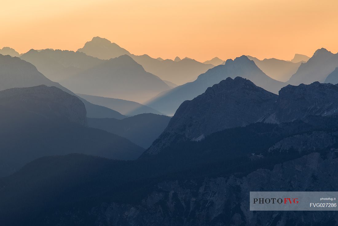 Silhouette of peaks at dawn photographed from the Lagazuoi refuge, Dolomites, Cortina d'Ampezzo, Italy