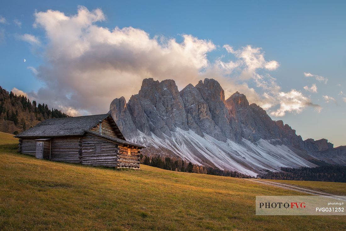 The Odle mountain range at sunset from the path to the Gampen Alm refuge, Dolomites, Funes Valley, Italy The Odle mountain range at sunset from the path to the Gampen Alm refuge, Dolomites, Funes Valley, Italy