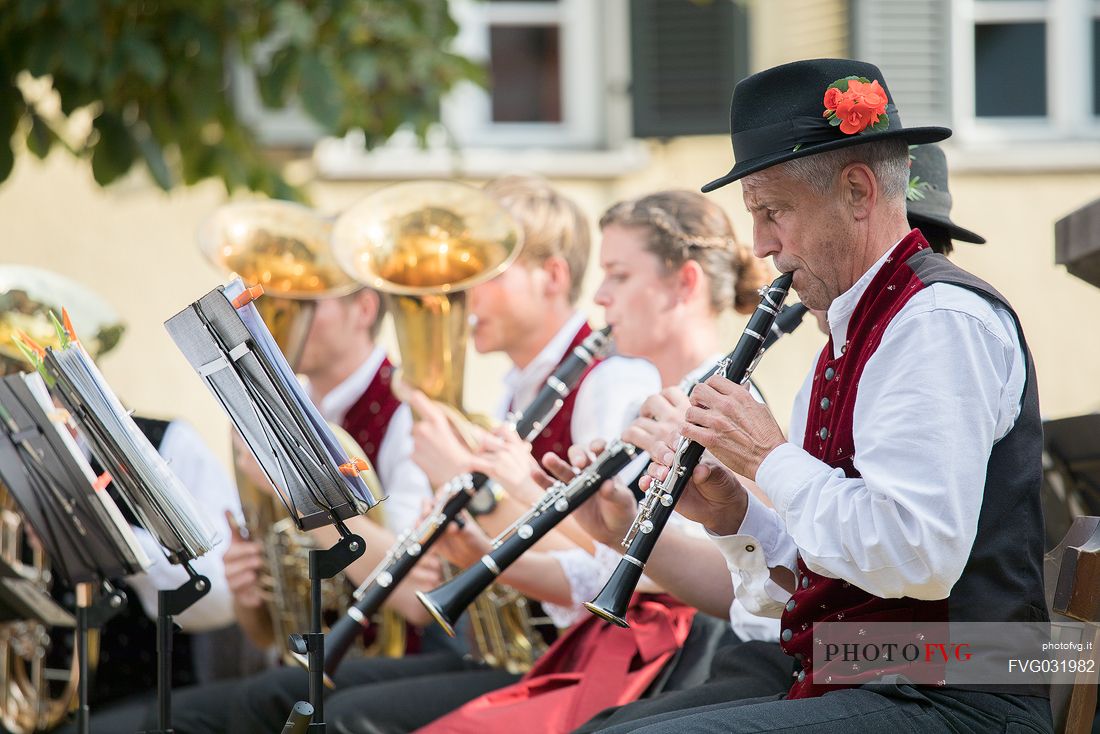 Tyrolean music band during the chestnut festival, Torgellen, in Chiusa village, Isarco valley, Trentino Alto Adige, Italy, Europe