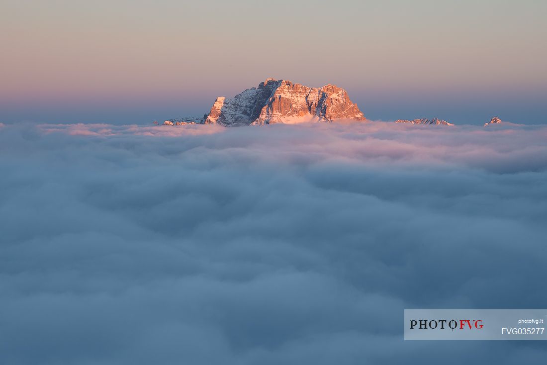 Sorapiss Mount above a sea of clouds at sunset, Cortina d'Ampezzo, dolomites, Veneto, Italy, Europe