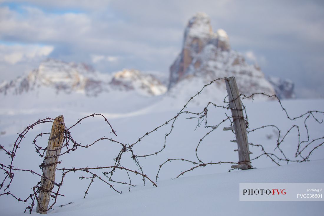 Traces of the great war from Piana Mount, on background the Tre Cime di Lavaredo and the Dolomites of Sesto, Auronzo di Cadore, Veneto, Italy