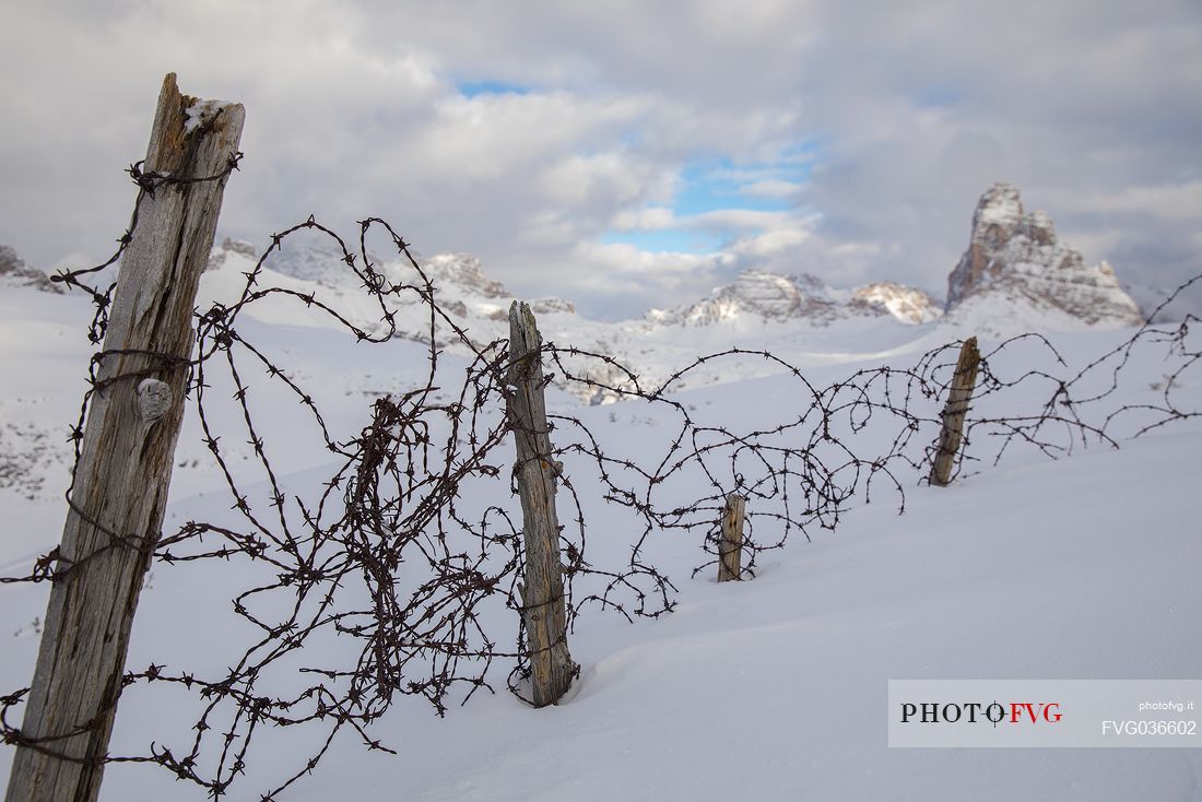 Traces of the great war from Piana Mount, on background the Tre Cime di Lavaredo and the Dolomites of Sesto, Auronzo di Cadore, Veneto, Italy