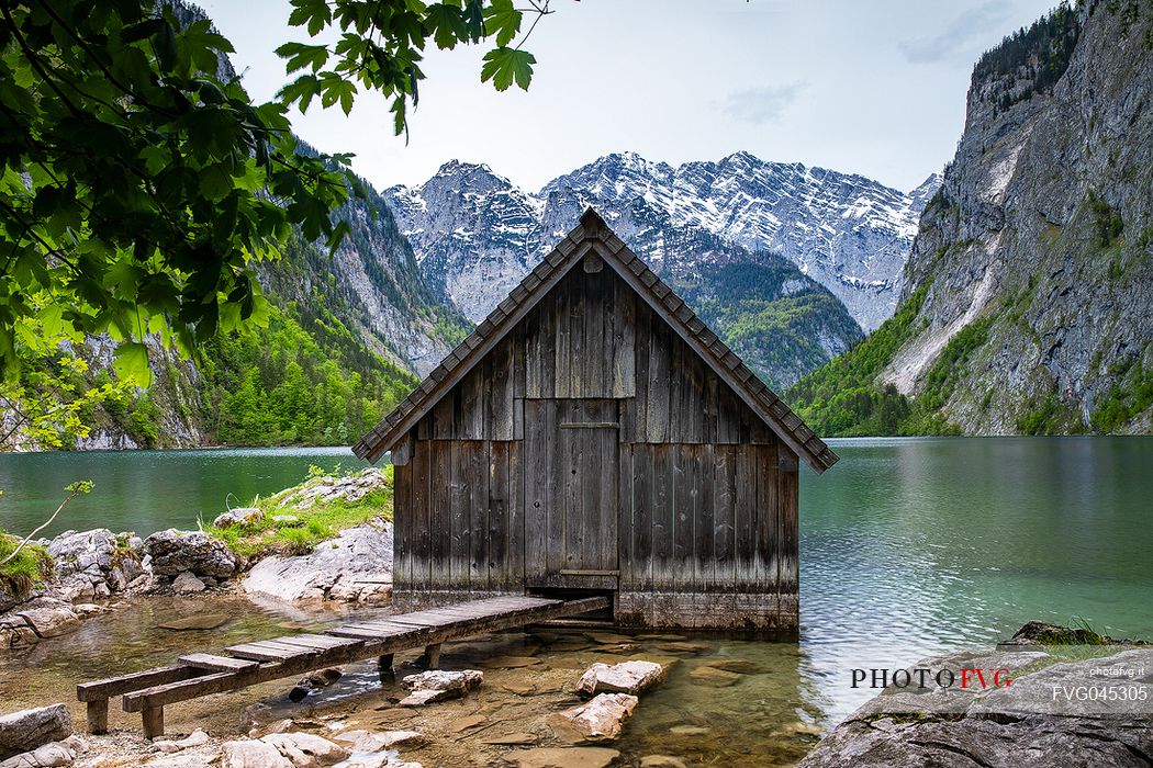 Fishing hut on lake Obersee against Watzmann mountain, Berchtesgaden National Park, Upper Bavaria. Germany