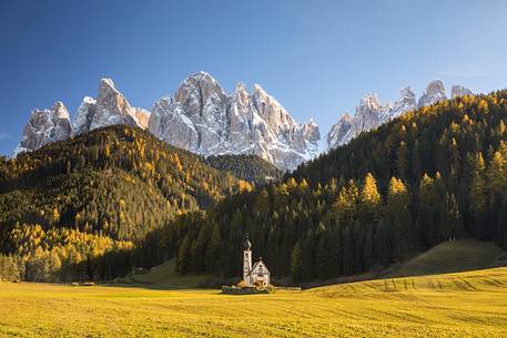 The church of San Giovanni with the Odle on background in the Funes valley