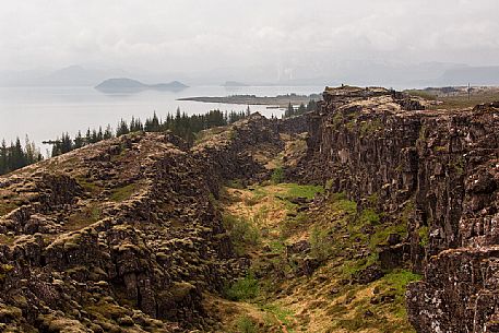 ingvellir is a national park of Iceland in the south- west. 
It is located inside a huge rift caused by the separation of two tectonic plates , the North American and Eurasian