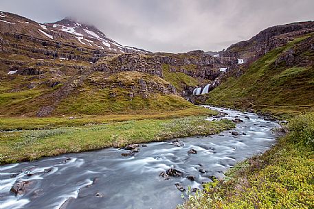 The landscape of Mjifjrur ('Narrow Fjord') full of waterfall in the east of Iceland
