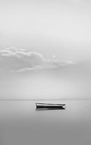The lonely boat in the lagoon of Grado