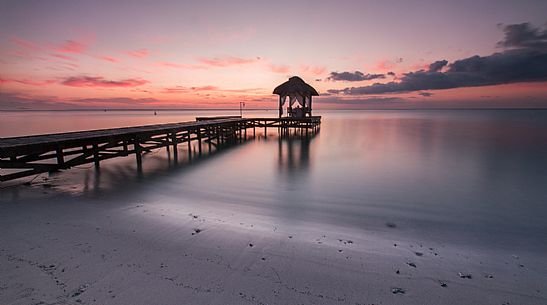 The pier on the beach of Flic en Flac in Mauritius 