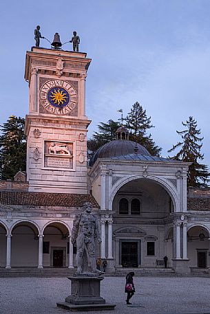 The clock tower, the Loggia di San Giovanni and the statue of Hercules in Freedom Square in the historical center of Udine
