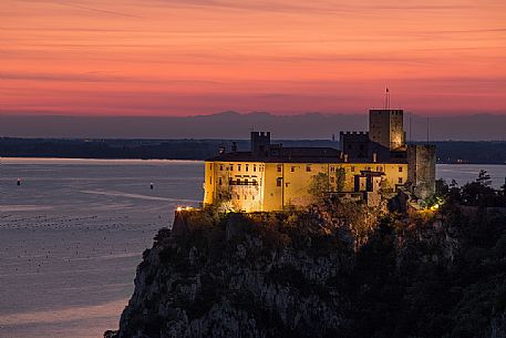 The Duino castle in Trieste seen from the Rilke trail at sunset